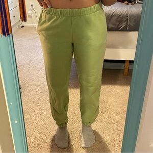 Bright green Brandy Melville cuffed sweatpants